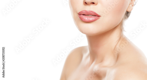 Cuadros en Lienzo beautiful female lips with lip gloss and nacked shoulders on white background