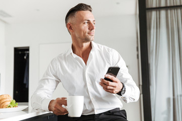 Wall Mural - Smiling man dressed in formal clothes
