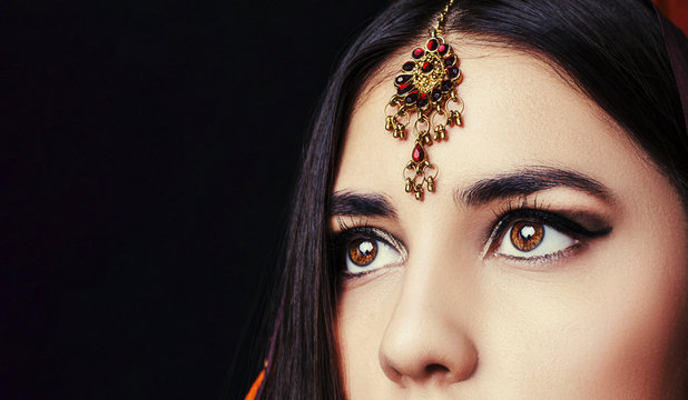 beauty brunette indian woman portrait. hindu model girl with brown eyes. close-up