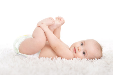 cute baby girl on white blanket