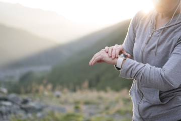 Watch for sports with smartwatch. Jogging training for marathon.