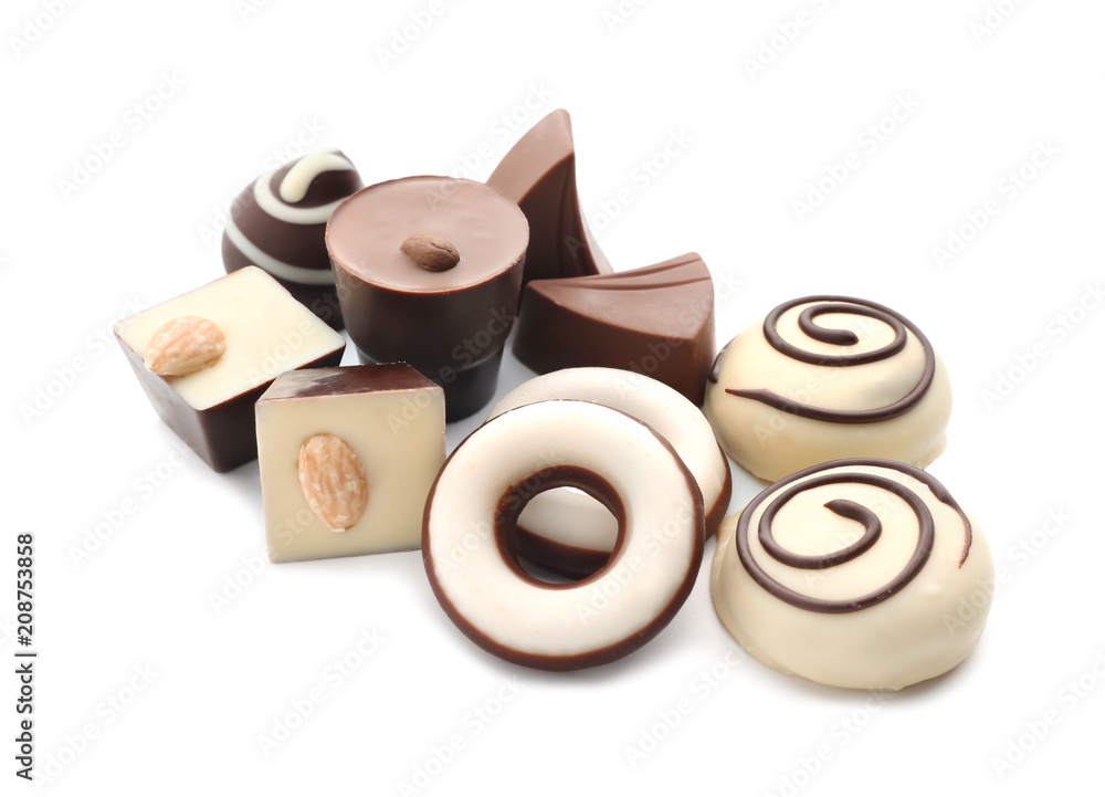 Tasty chocolate candies on white background