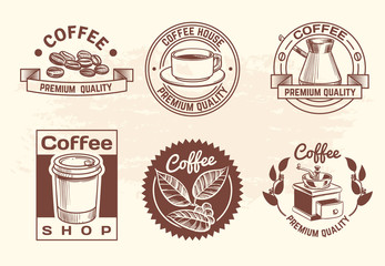 Sticker - Vintage hand drawn hot drinks coffee logos with mug and beans. Isolated coffee shop vector labels