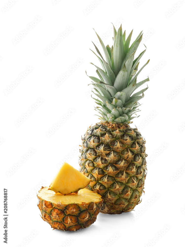Delicious pineapple and slices on white background