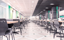 Modern Interior Of Cafeteria Or Canteen With Chairs And Tables