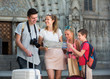 © JackF - Positive family using map and visiting sights of European city