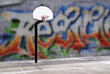 Urban basketball hoop inner city innercity wall and asphalt in outdoor park