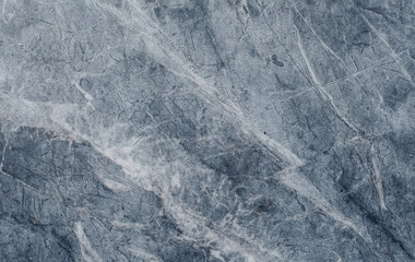 fragment of stone texture with scratches and cracks. natural background.