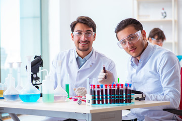 Team of chemists working in the lab