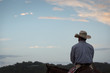 Cowboy at sunset, silhouette