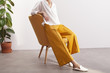 © milamila/Stocksy - fashionable woman wearing culottes