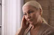 © New Africa - Mature woman suffering from depression at home