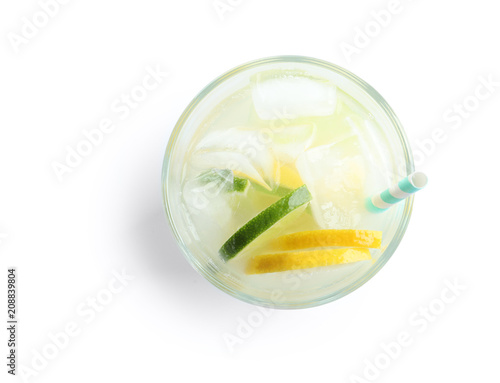 Fotomural Glass of natural lemonade with citrus fruits on white background, top view
