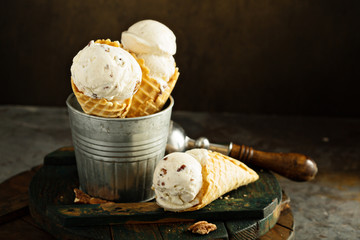 Butter pecan ice cream in waffle cones