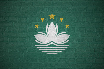 Flag of Macau on brick wall, 3d illustration