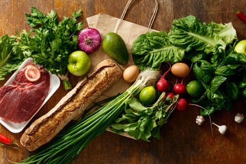 Canvas Print - Paper bag set healthy food dark background