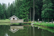 Log Cabin On A Lake.