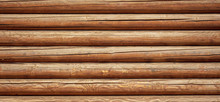 Logs On The Wall With A Log Frame As A Background
