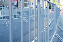 Portable Metal Grilles Of Light Gray Color For The Obstruction Of The Territory And Organization Of The Queue For The Event