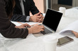 © xreflex - Group Asian Young Businessmen and woman working with laptop in the conference room. they are business startup and analyzing.  brainstorming, teamwork, meeting concept.