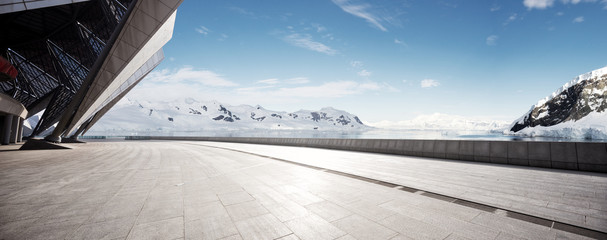 empty brick ground with sonw mountain as background