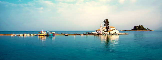 Wall Mural - nice view of vlacherna monastery on the kanoni peninsula in kerkyra, corfu, greece. popular tourist 
