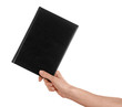 © Pixel-Shot - Female hand holding book with blank cover on white background