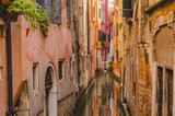 Fototapeta Uliczki - Old Houses Along Narrow Canal in Venice, Italy