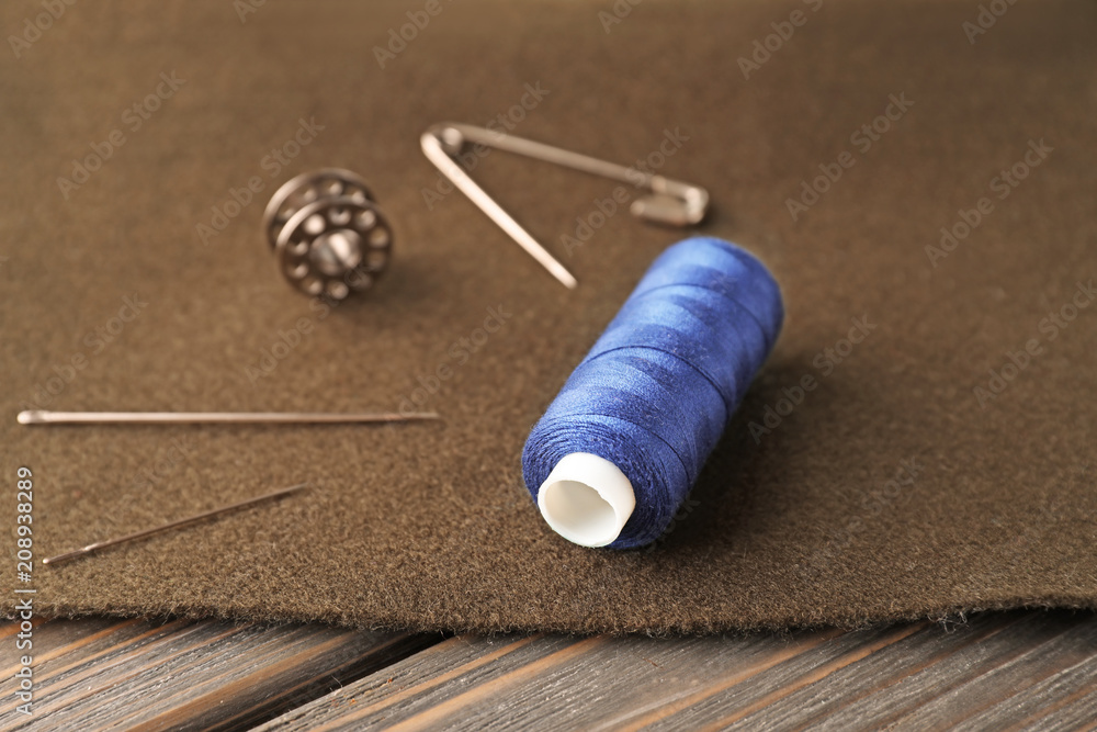 Sewing accessories on fabric