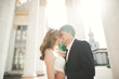 © olegparylyak - Luxury married wedding couple, bride and groom posing in old city