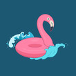 Pink flamingo inflatable pool float on the waves