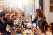 © jackfrog - Mixed group of friends having fun while sharing a meal