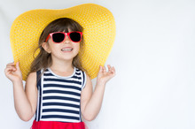 Laughing Kid In Big Hat And Sunglasses Ready For Funny Summer Holiday. Conceptual Summer Vacation.