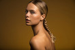 © Lindsay Adler - Woman with braid looking at camera