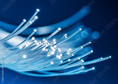 Cuadros en Lienzo Bundle of optical fibers with lights in the ends