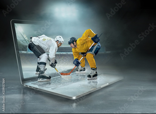 Fototapeta na szkło Caucasian ice hockey Players in dynamic action in a professional