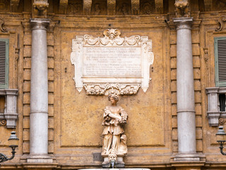 Wall Mural - Palermo, Italy April, 2018: Statues representing the spring at the Quattro Canti, Palermo Baroque facade at the sout corner in the historic center of Palermo