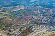 Aerial shot over Solna and Bromma airport below