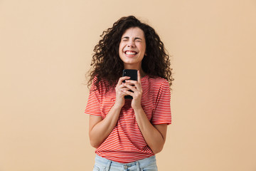 Sticker - Portrait of a cheerful young girl with curly hair