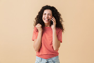 Canvas Print - Portrait of a cheerful young girl with curly hair