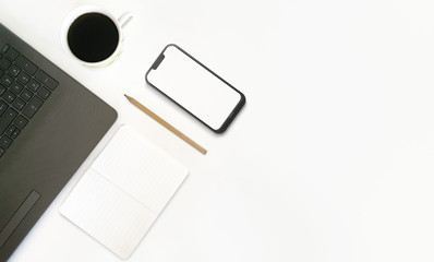 Wall Mural - top view of office desk with laptop, mobile phone, notebook, pencil and coffee