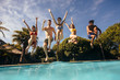 © Jacob Lund - Friends having fun at holiday resort pool