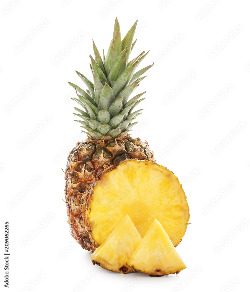 Delicious pineapple with slices on white background
