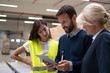 © Stock Rocket - Managers checking the list of products