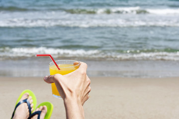 Wall Mural - young man relaxing on the beach