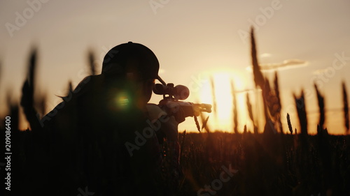 Fotomural A sniper rifles from a rifle with an optical sight