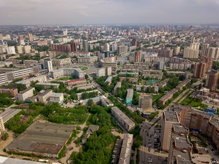 Wall Mural - Old and new russian buildings in green area in the city with a lot of cars. Russian streets, Novosibirsk.