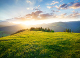 Fototapeta Natura - Sunset in the mountain valley. Beautiful natural landscape in the summer time