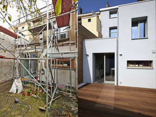 Construction of a new facade in courtyard  from old house before and after