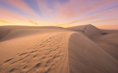 Famous natural park Maspalomas dunes in Gran Canaria at sunrise, Canary island, Spain